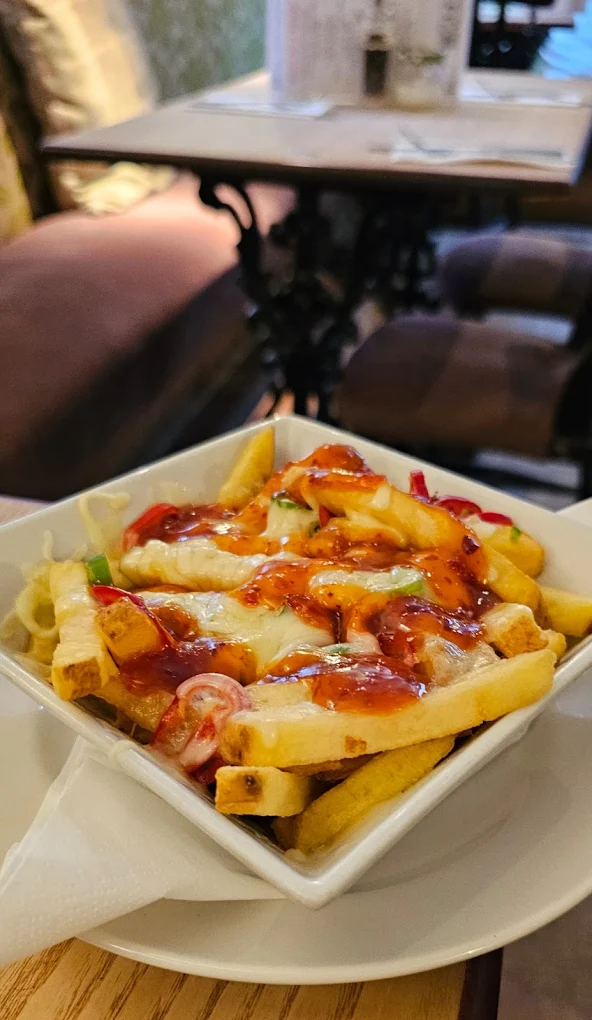Dining area with traditional decor and banquette seating